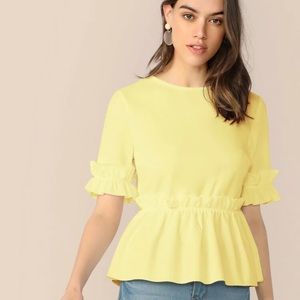 Ruffled peplum top
